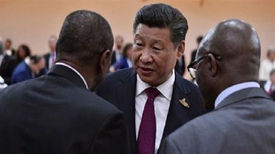 Le prsident chinois, Xi Jinping (au centre) s'entretient avec ses homologues de 
la Rpublique de Guine, Alpha Cond ( gauche) et de l'Afrique du Sud, Jacob 
Zuma ( droite), le 7 juillet 2017 en marge du G20  Hambourg, en Allemagne